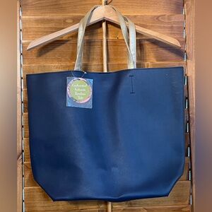 Elegant Navy Blue Tote Bag with Gold Handles and a Magnetic Closure